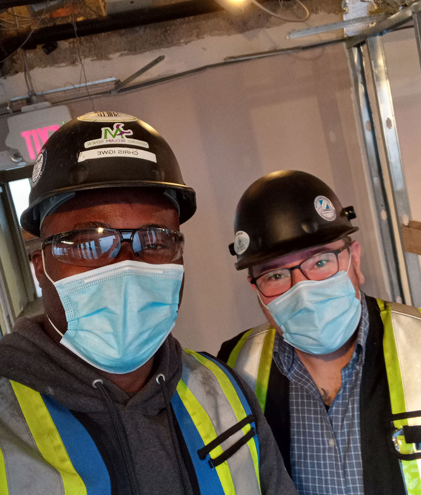 qm-employee-saftey-first Employees in masks